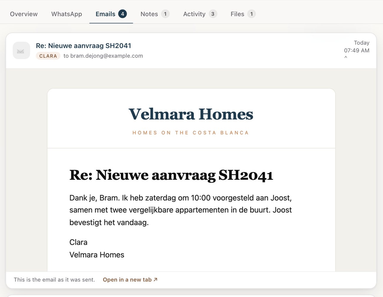 A reply to the client in their own language, sent from the agency's address.